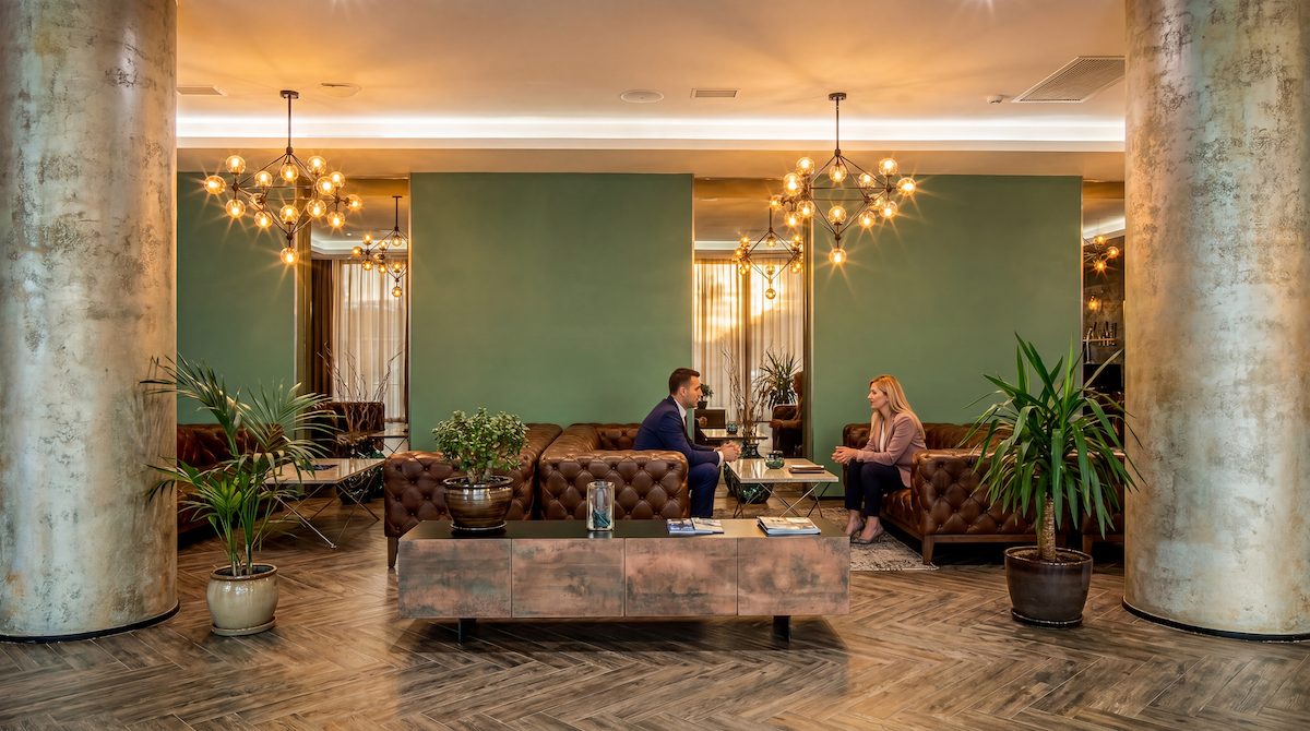 King David Residences green wall lounge.